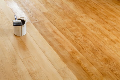 Restore a hardwood floor, sanding and staining wooden floor in a room, UK