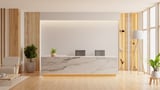 Modern minimalist reception area with marble front desk