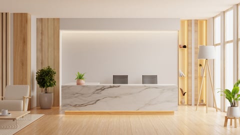 Modern minimalist reception area with marble front desk