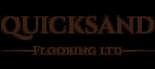 Quicksand Flooring Ltd logo in brown text on black background